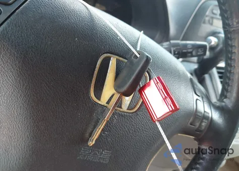 2010 Honda Odyssey Ex-L z USA, uszkodzony, nr VIN 5FNRL3H63AB011747